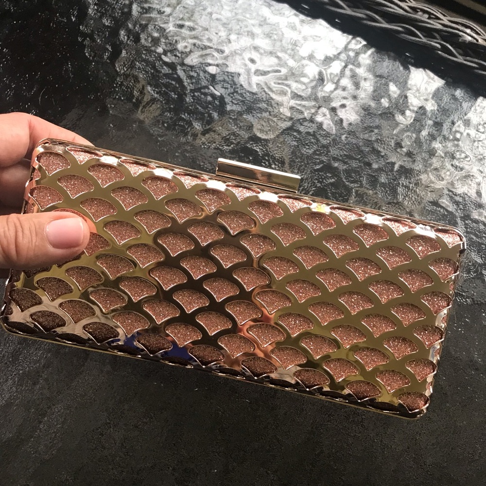 Rose gold clutch purse